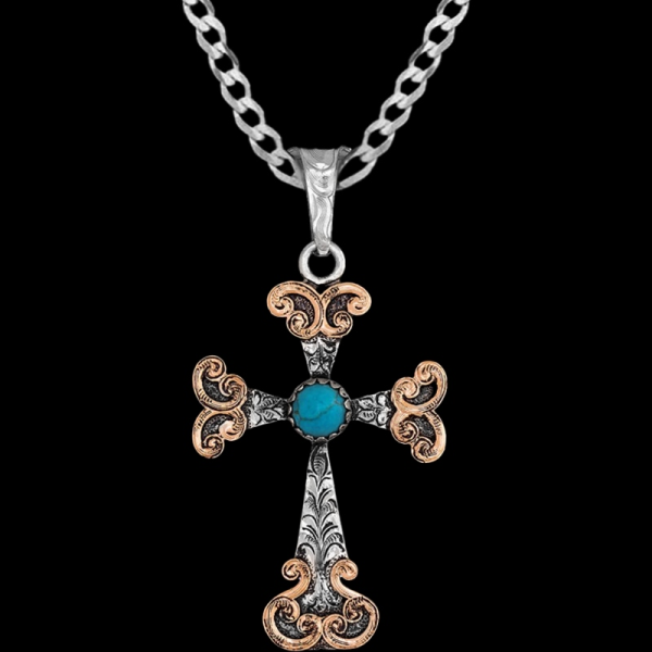 Meet our Numbers Cross Pendant Necklace: a captivating German Silver Cross with copper scrollwork a stunning turquoise stone. Pair it with a special discount sterling silver chain today!

 